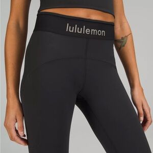 Lululemon Logo Waistband Everlux High-Rise Tight 25" Sz 6 black leggings